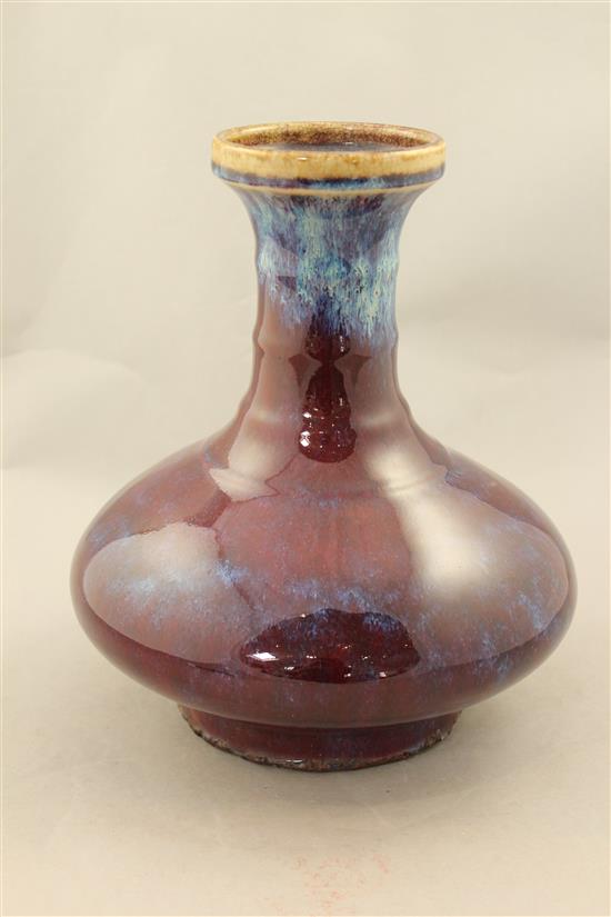 A Chinese flambe glazed bottle vase, Yongzheng mark but later, 26cm